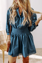 Prussian Blue mini dress by Mommas Hive with 3/4 sleeves, shirred high waist, and button details, made of 100% cotton.
