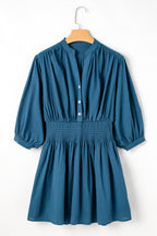 Prussian Blue Mini Dress by Mommas Hive with 3/4 sleeves, shirred high waist, and button details, made of 100% cotton.