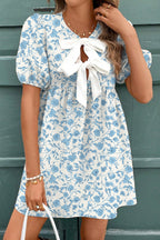 Sky blue floral contrast bow puff sleeve mini dress by Mommas Hive, showcasing a fitted mini dress with puff sleeves and bow detail.