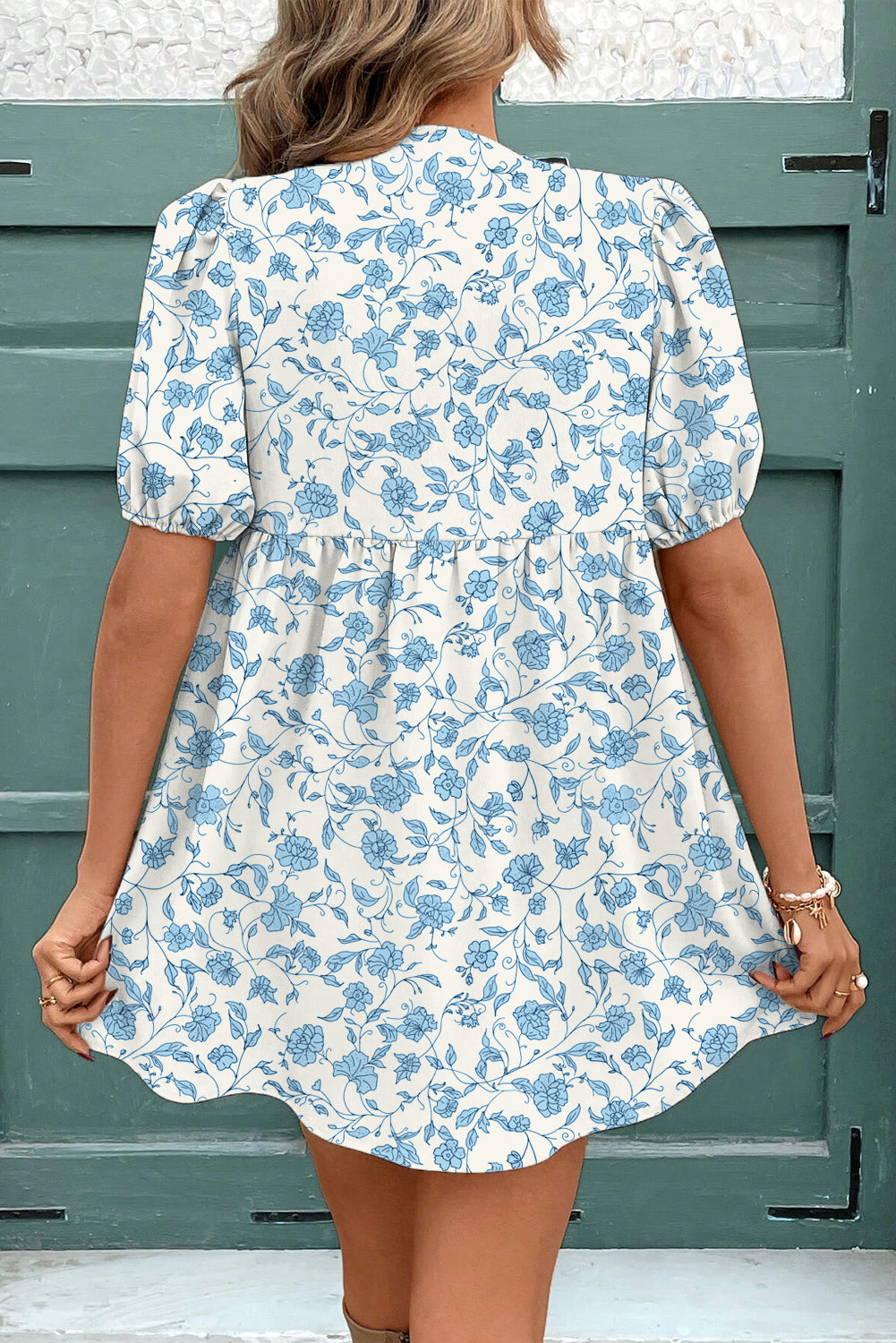 Sky blue floral contrast bow puff sleeve mini dress by Mommas Hive, featuring a fitted mini dress with puff sleeves and bow detail.
