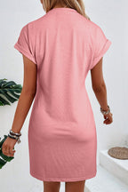 Light French beige T-shirt dress with center seam and rolled cuffs by Mommas Hive, casual and comfortable for everyday wear.