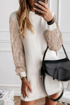 White sequin puff sleeve shift mini dress by Mommas Hive, featuring a stylish design with puff sleeves and a fitted silhouette.