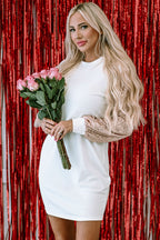 White sequin puff sleeve shift mini dress by Mommas Hive, featuring a stylish mini length and elegant puff sleeves.