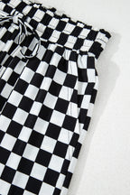 Black checkered print long sleeve top and pants lounge set by Mommas Hive, comfortable loungewear for relaxed style.