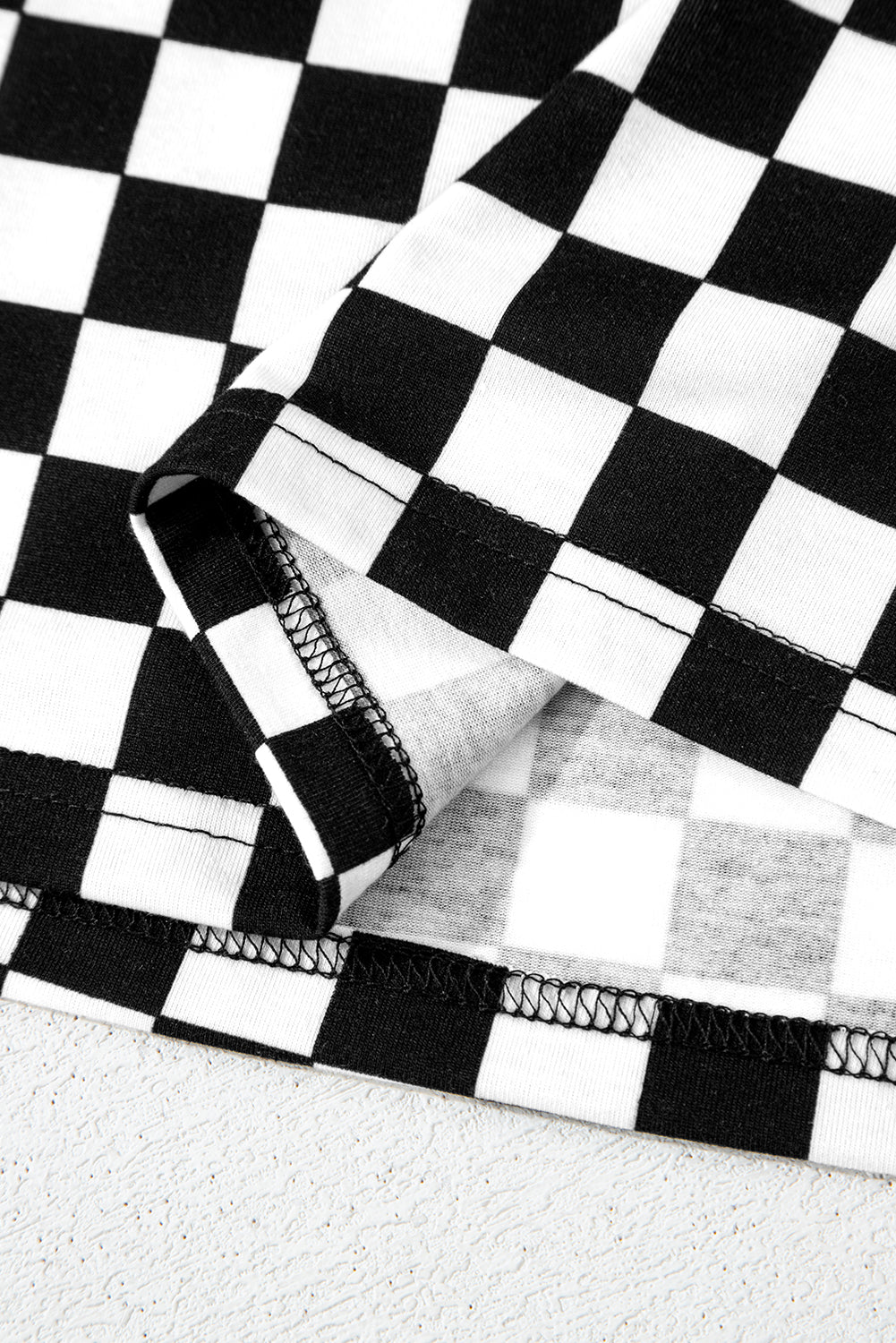 Mommas Hive black checkered print long sleeve top and pants lounge set, cozy loungewear made of polyester and elastane.