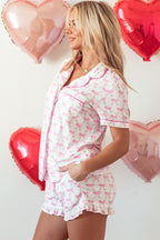 Pink bowknot printed short sleeve and ruffled shorts pajama set from Mommas Hive, perfect for Valentine's sleepwear.