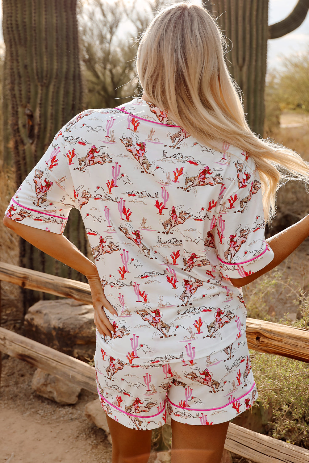 White cowgirl country print pajamas set from Mommas Hive, soft loungewear with comfortable polyester-elastane blend.