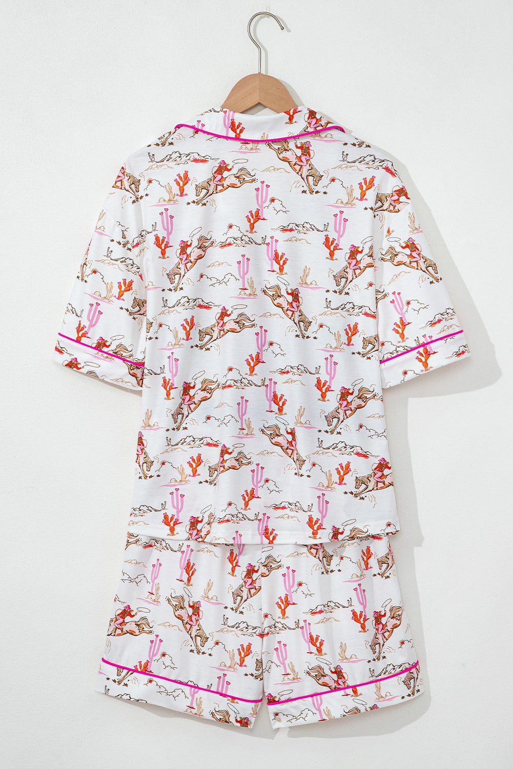 White cowgirl country print pajamas set from Mommas Hive, cozy loungewear with soft polyester and elastane for comfortable sleep.