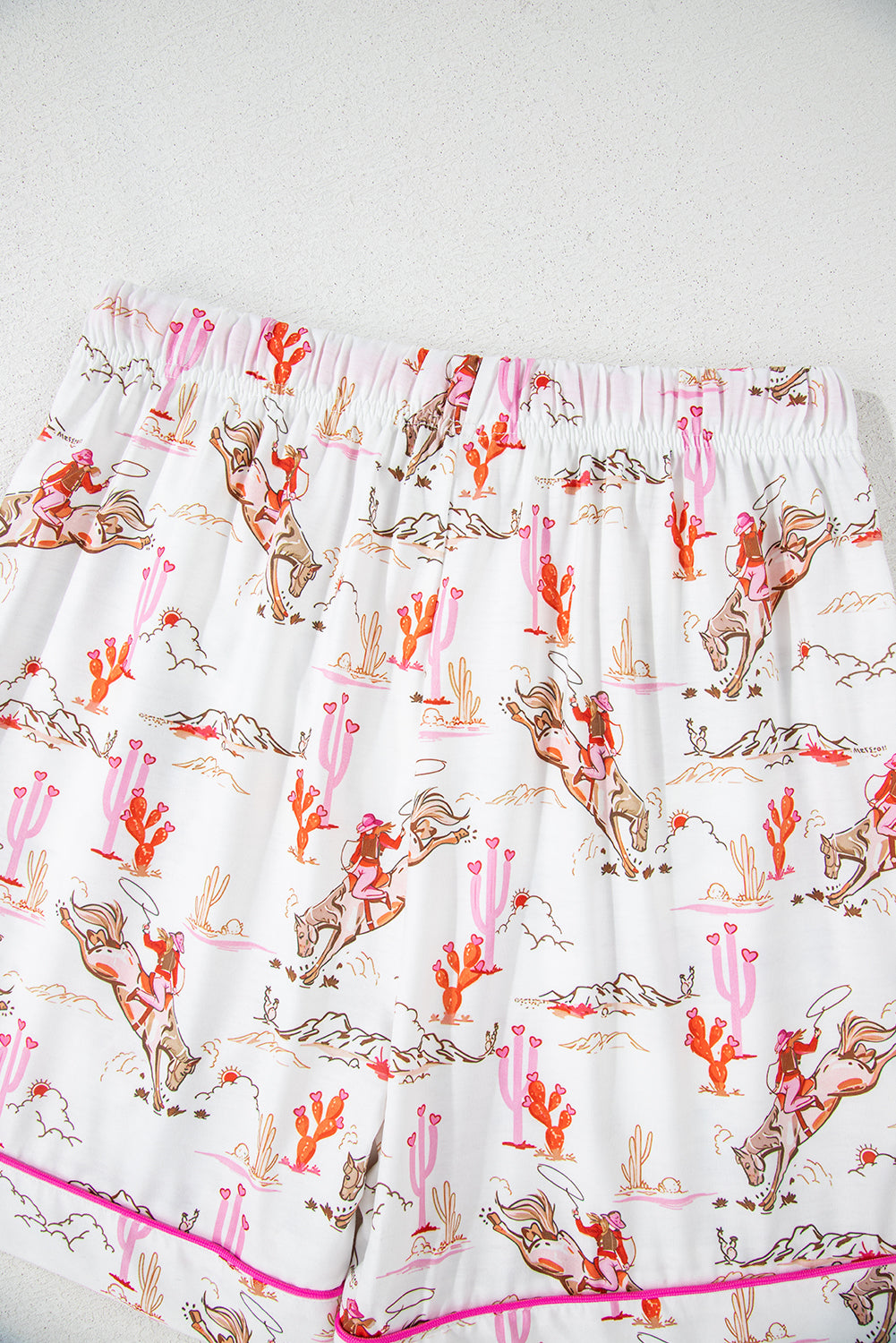 White cowgirl country print pajamas set by Mommas Hive, soft polyester and elastane loungewear for comfortable sleep.