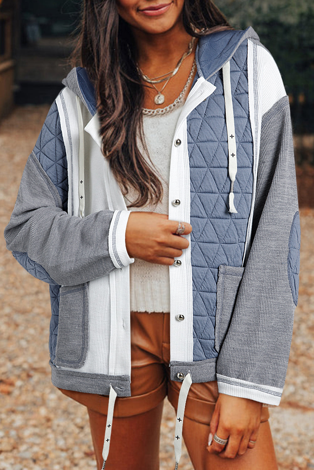 Light blue quilted textured patchwork loose-fit hooded jacket by Mommas Hive, featuring a soft polyester-elastane blend outerwear design.