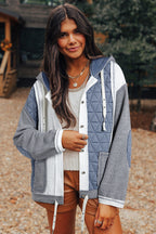 Light blue quilted patchwork loose fit hooded jacket by Mommas Hive, textured polyester and elastane outerwear with a relaxed style.