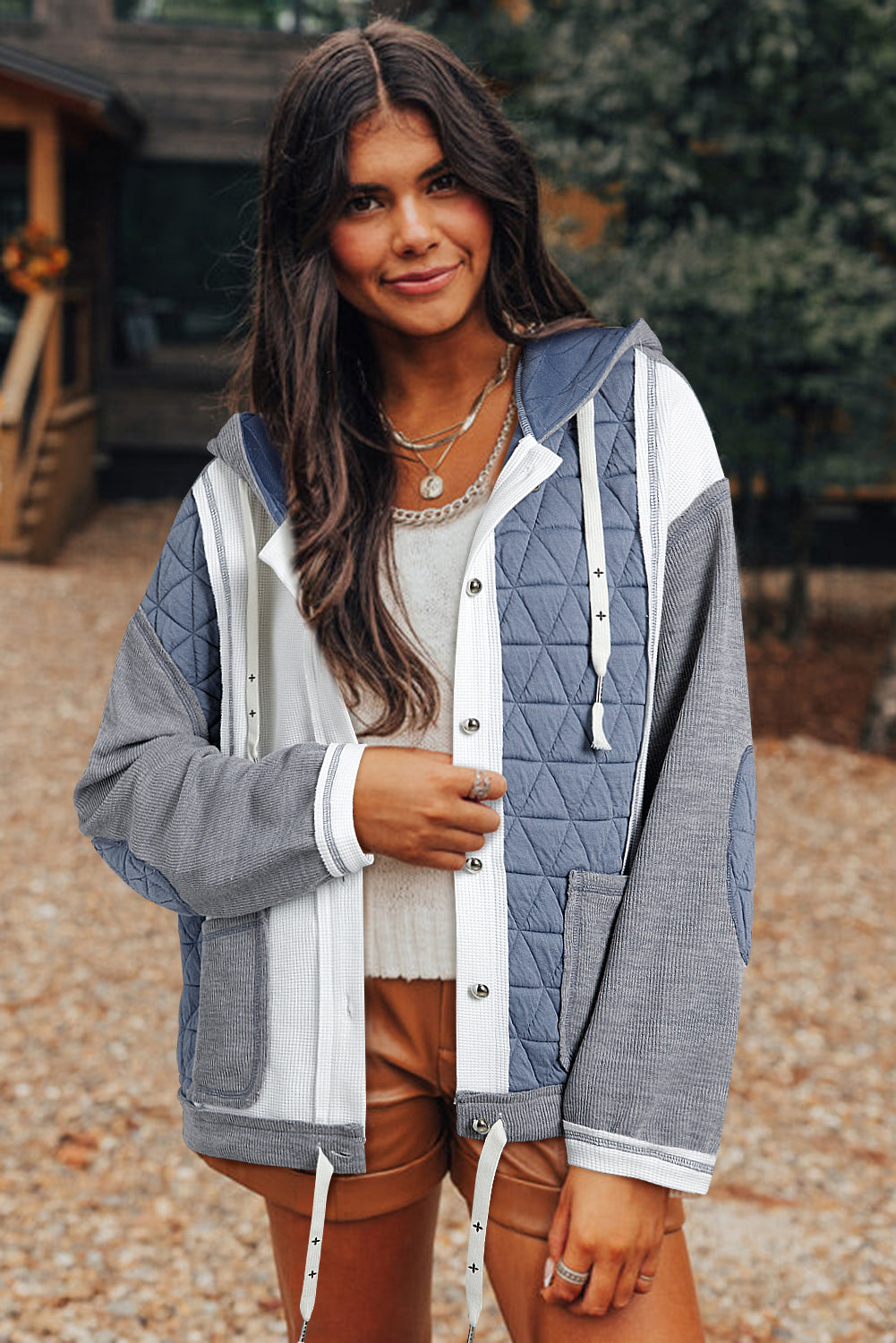 Light blue quilted patchwork loose fit hooded jacket by Mommas Hive, textured polyester and elastane outerwear with a relaxed style.