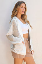 Light blue quilted textured patchwork hooded jacket from Mommas Hive, loose fit outerwear with soft polyester and elastane blend.