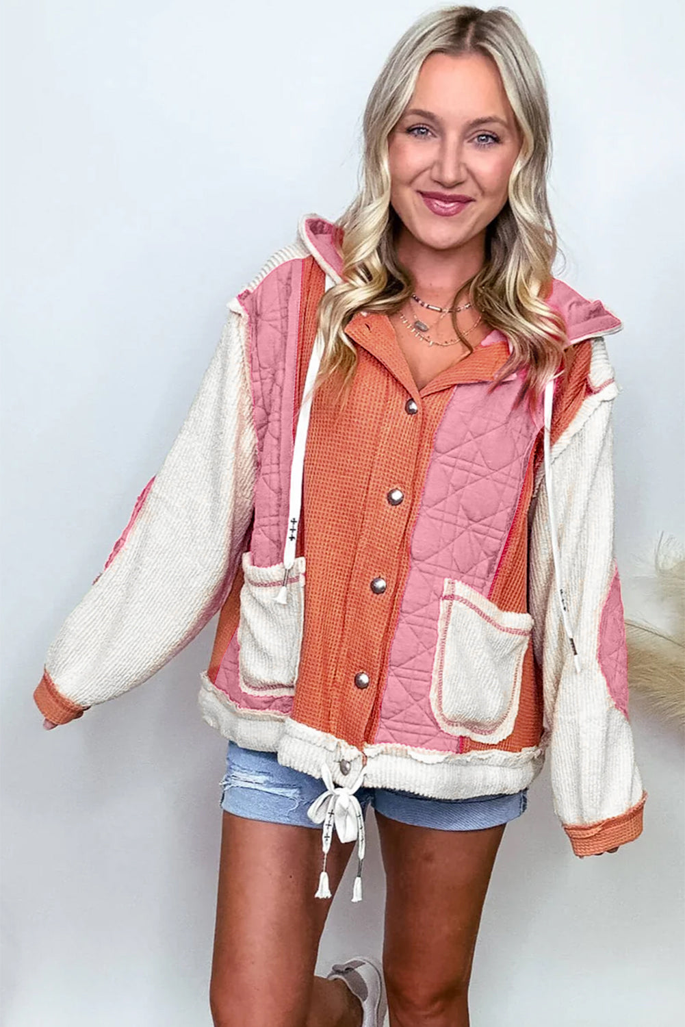 Light blue quilted textured patchwork loose fit hooded jacket by Mommas Hive, showcasing its cozy outerwear design and casual style.