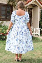 Sky blue floral print plus size midi dress with sweetheart neckline by Mommas Hive, made of lightweight polyester.