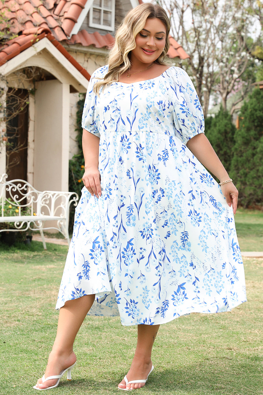 Sky blue floral print plus size midi dress with sweetheart neckline by Mommas Hive, made of lightweight polyester fabric.