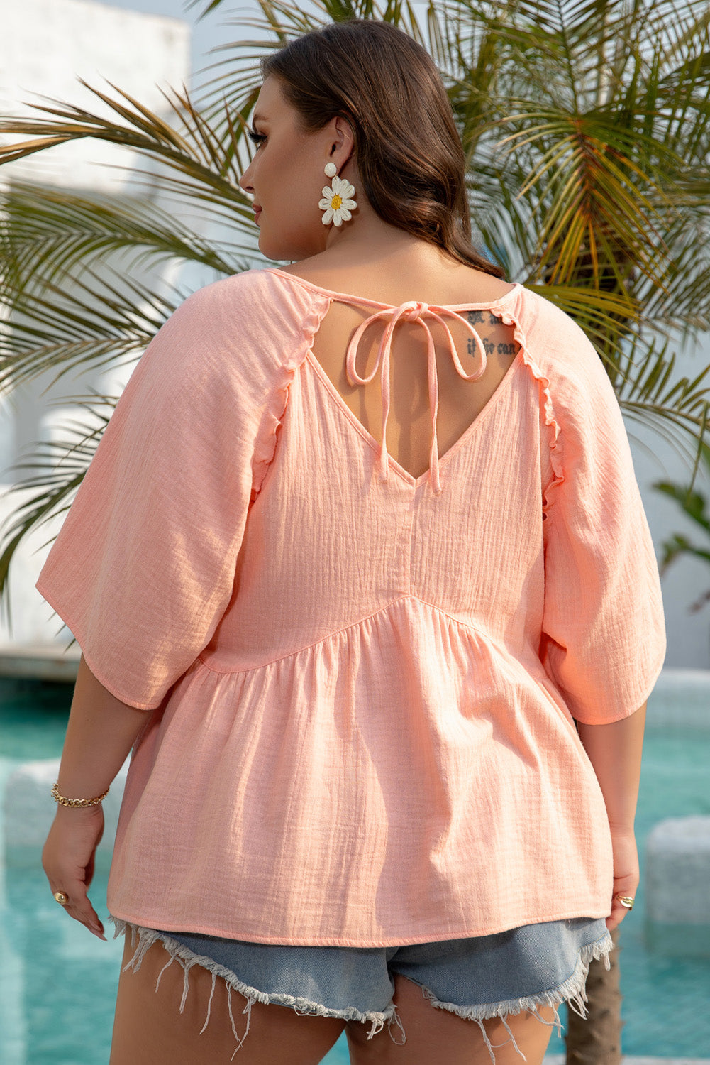 Apricot pink plus size textured babydoll blouse with wide short sleeves, 100% cotton, from Mommas Hive.