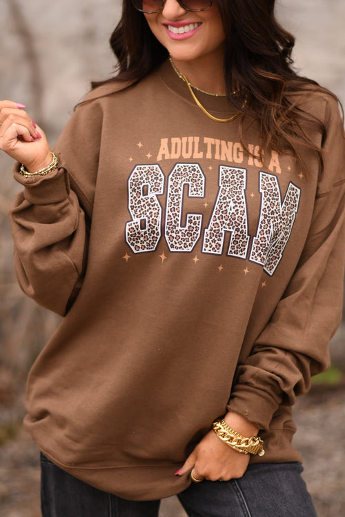 Small Mommas Hive "Adulting is a Scam" quote sticker showing bold black text on a white background.
