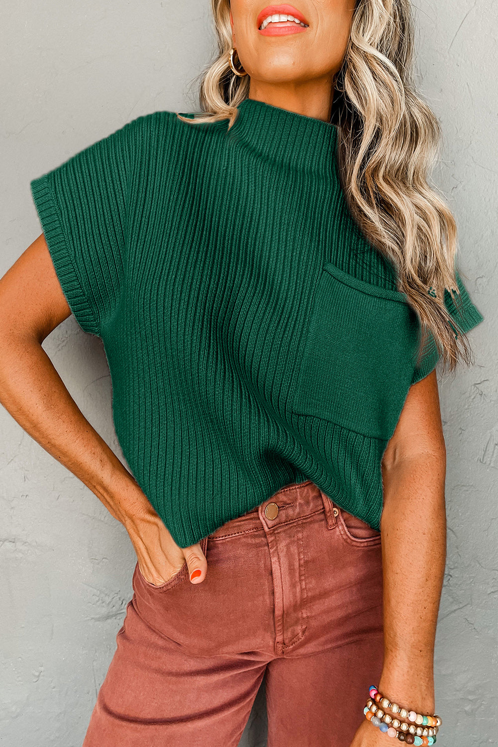 Mommas Hive oatmeal ribbed knit short sleeve sweater with patch pocket, made of viscose, polyester, and polyamide fabric.