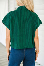 Mommas Hive oatmeal ribbed knit short sleeve sweater with patch pockets, made of viscose, polyester, and polyamide.