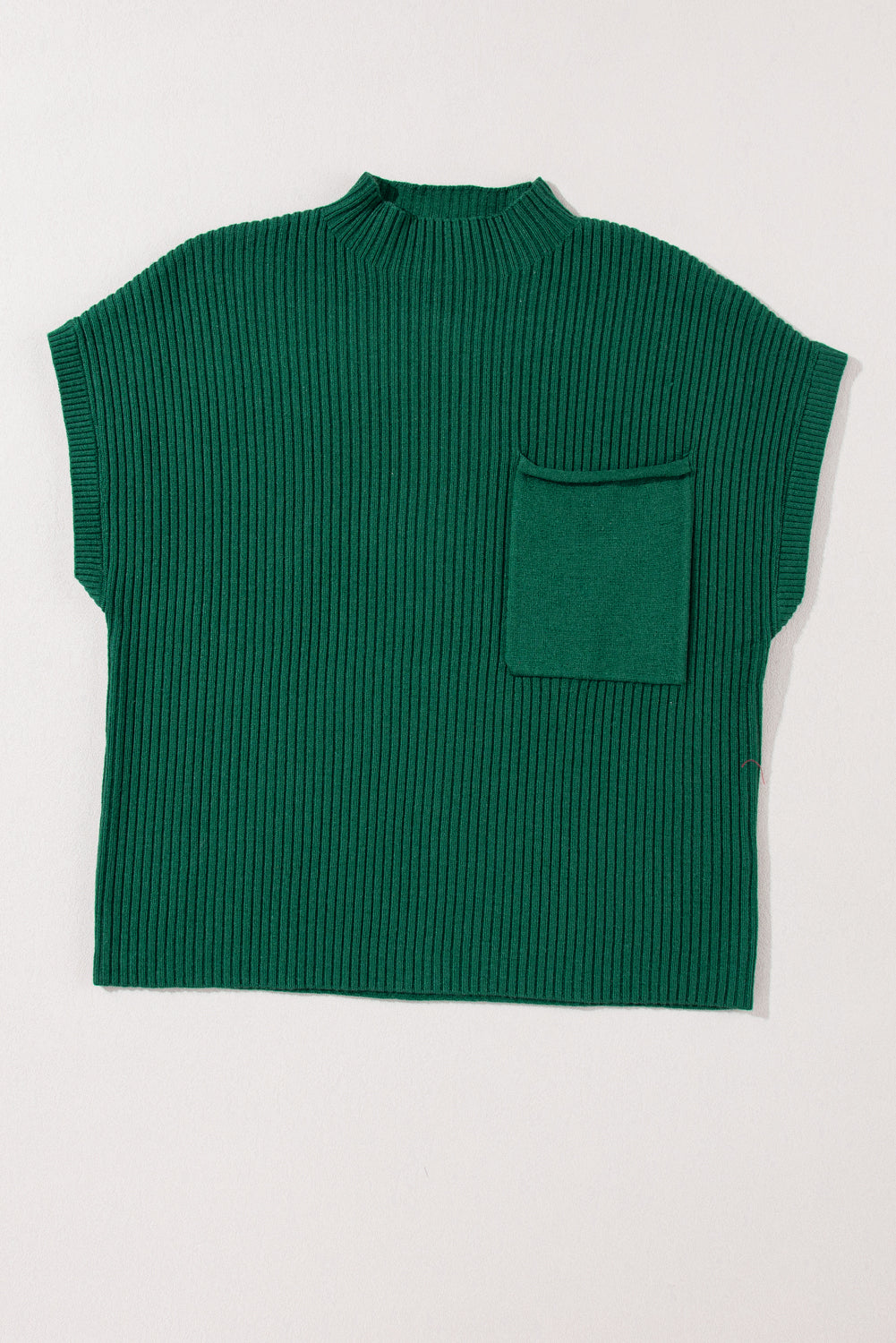 Mommas Hive oatmeal ribbed knit short sleeve sweater with patch pocket, made of viscose, polyester, and polyamide fibers.