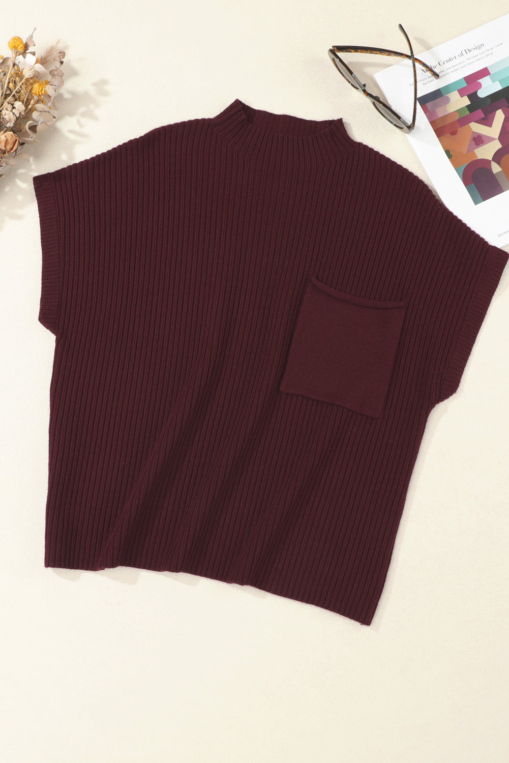 Mommas Hive oatmeal ribbed knit short sleeve sweater with patch pocket, made of viscose, polyester, and polyamide.