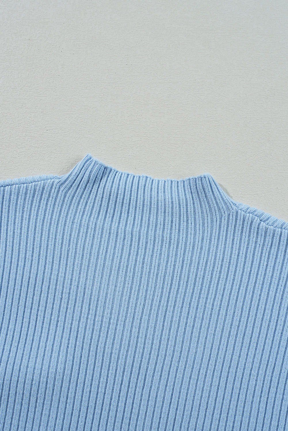Mommas Hive oatmeal ribbed knit short sleeve sweater with patch pockets, made of viscose, polyester, and polyamide.