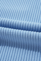 Mommas Hive oatmeal ribbed knit short sleeve sweater with patch pocket, made of viscose, polyester, and polyamide fibers.