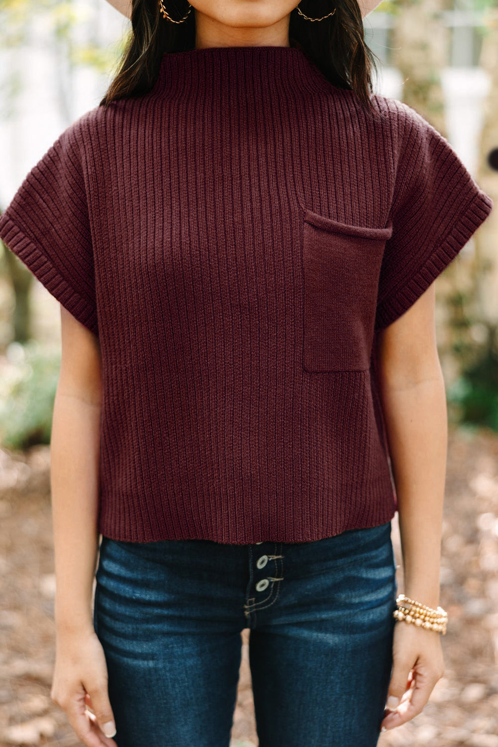 Mommas Hive oatmeal ribbed knit short sleeve sweater with patch pocket, made of viscose, polyester, and polyamide fabric.