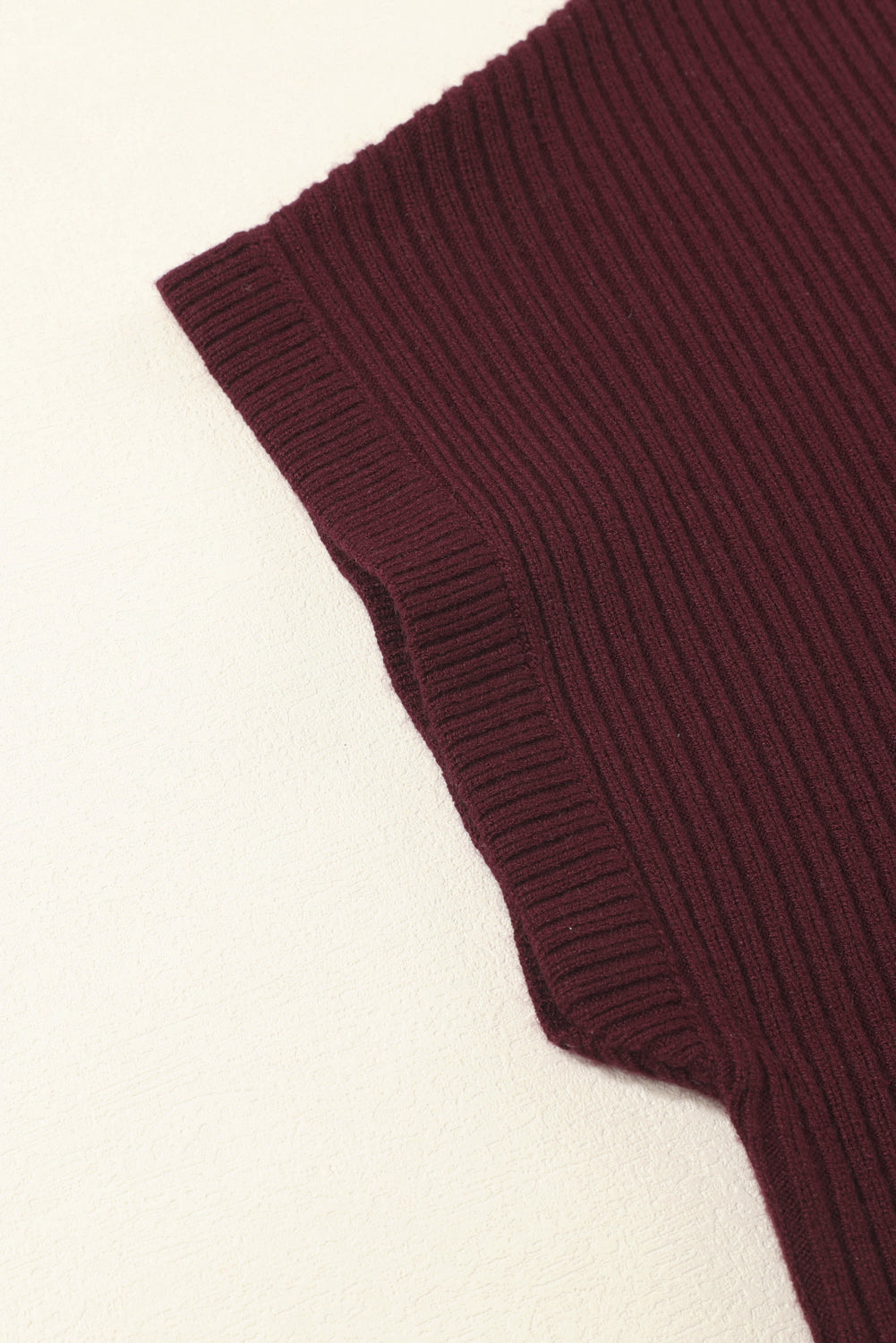 Mommas Hive oatmeal ribbed knit short sleeve sweater with patch pocket, made of viscose, polyester, and polyamide fibers.