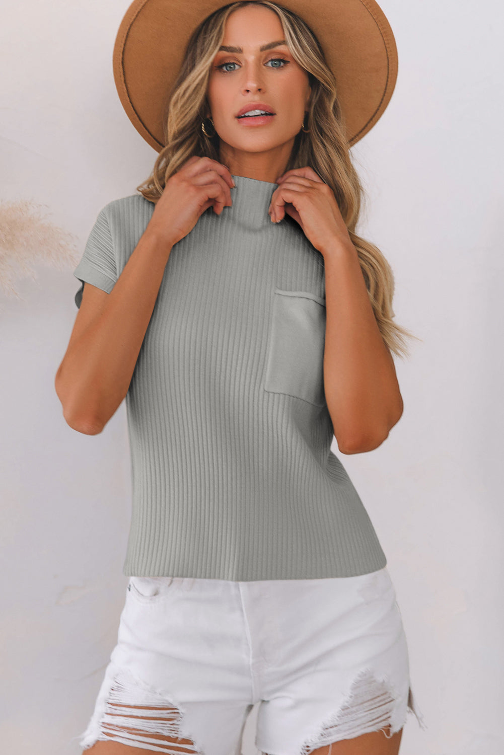 Oatmeal ribbed knit short sleeve sweater with patch pockets by Mommas Hive, made of viscose, polyester, and polyamide fabric.