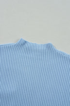 Mommas Hive oatmeal ribbed knit short sleeve sweater with patch pocket, made from viscose, polyester, and polyamide fabric.