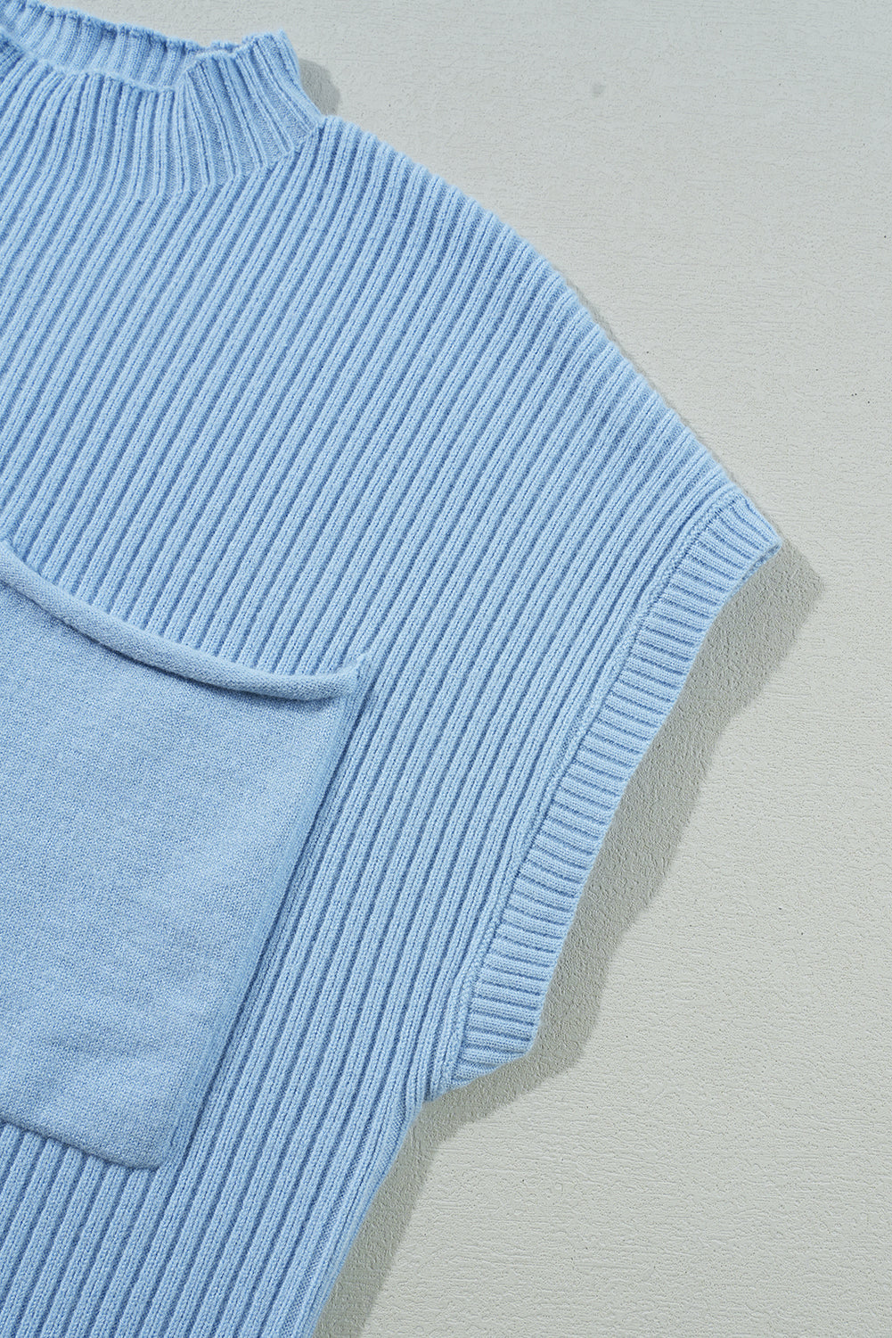 Mommas Hive oatmeal ribbed knit short sleeve sweater with patch pocket, stylish and cozy for casual wear.