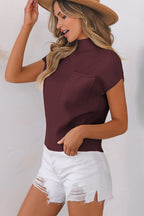 Mommas Hive oatmeal ribbed knit short sleeve sweater with patch pocket, made of viscose, polyester, and polyamide.