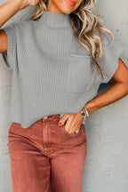 Mommas Hive oatmeal ribbed knit short sleeve sweater with patch pockets, made of viscose, polyester, and polyamide.