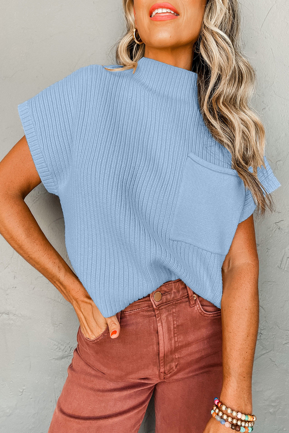 Mommas Hive oatmeal ribbed knit short sleeve sweater with patch pocket, made of viscose, polyester, and polyamide fabric.