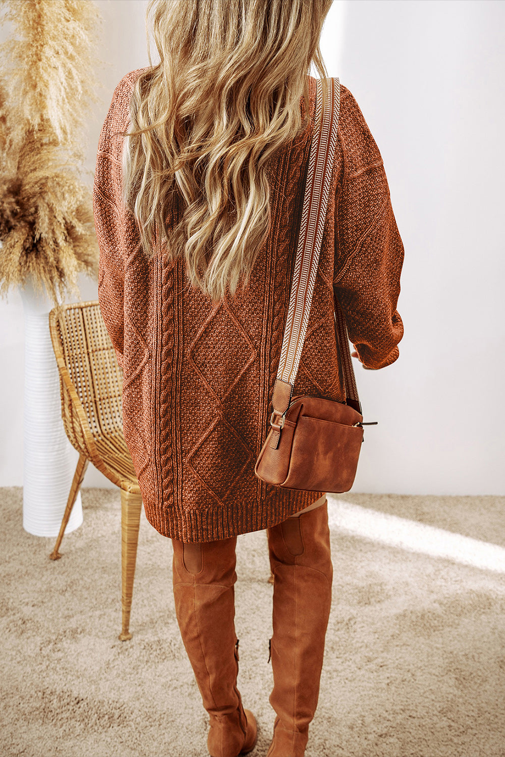 Mist green cable knit sweater dress by Mommas Hive featuring drop shoulders and a loose fit, perfect for casual wear.