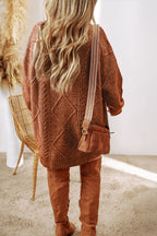 Mist green cable knit sweater dress by Mommas Hive with drop shoulders and a loose fit, perfect for cozy casual wear.