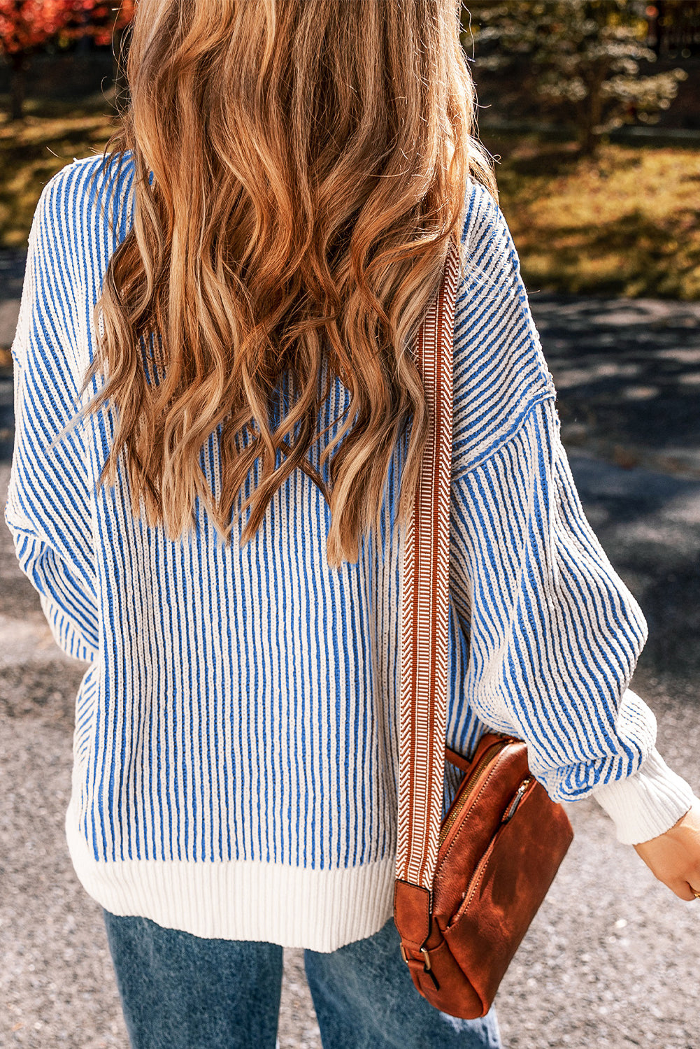Chestnut-colored striped textured knit loose sweater by Mommas Hive with contrast edge, perfect for casual wear.