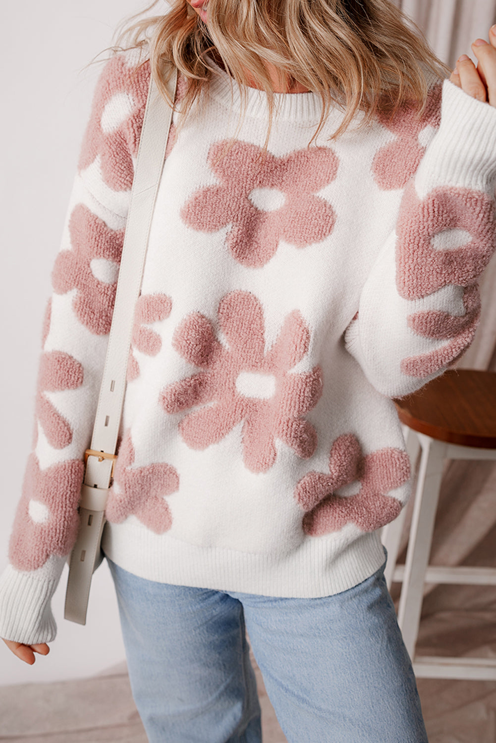 White textured flower drop shoulder loose sweater from Mommas Hive, featuring a cozy, relaxed fit with floral design details.