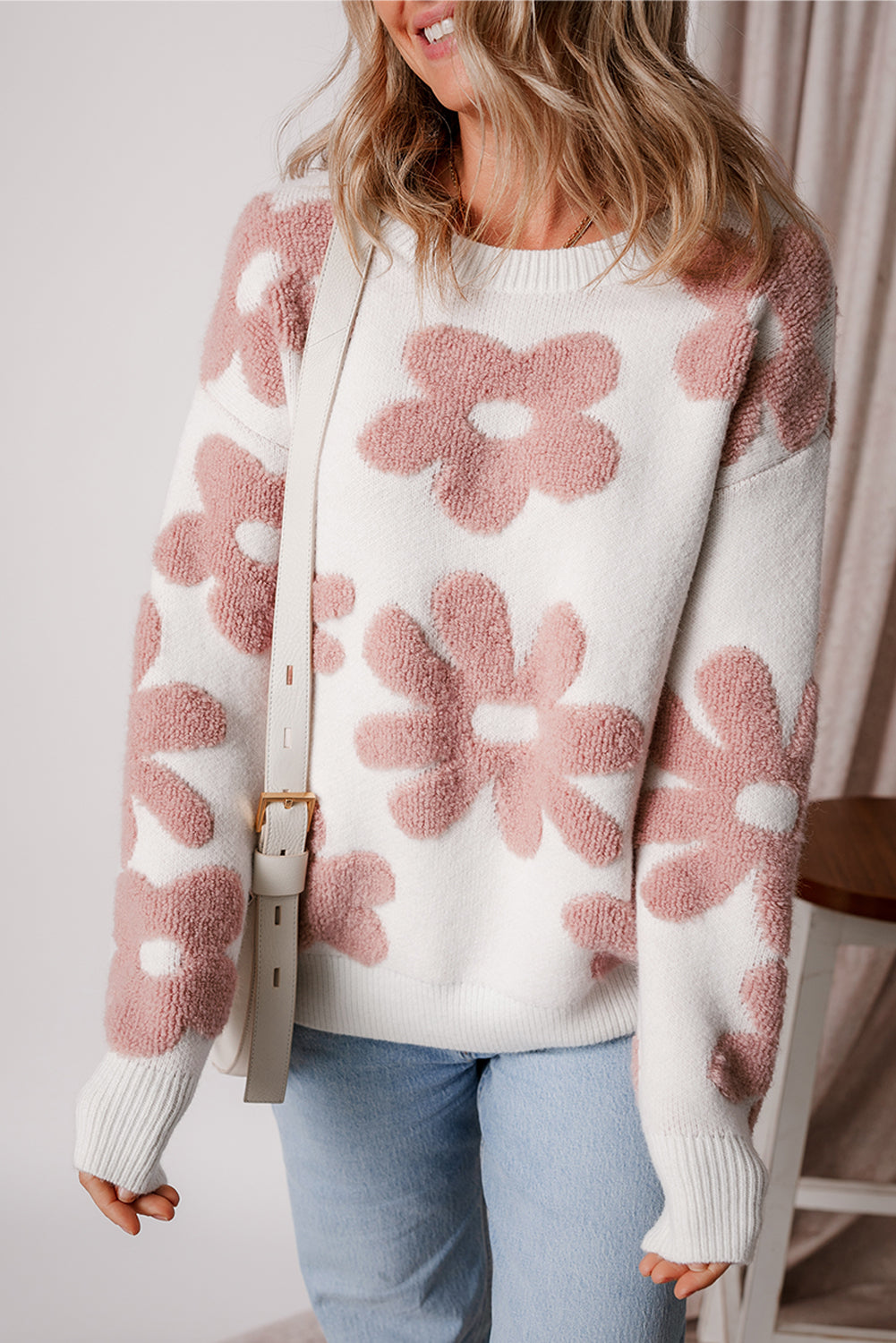White textured flower drop shoulder loose sweater by Mommas Hive, featuring a relaxed fit and floral knit pattern.