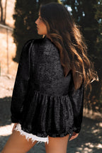 Black metallic babydoll blouse with frilled V-neck and puff sleeves from Mommas Hive, made of polyester.
