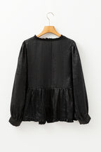 Black metallic babydoll blouse with frilled V-neck and puff sleeves, stylish top from Mommas Hive made of polyester.