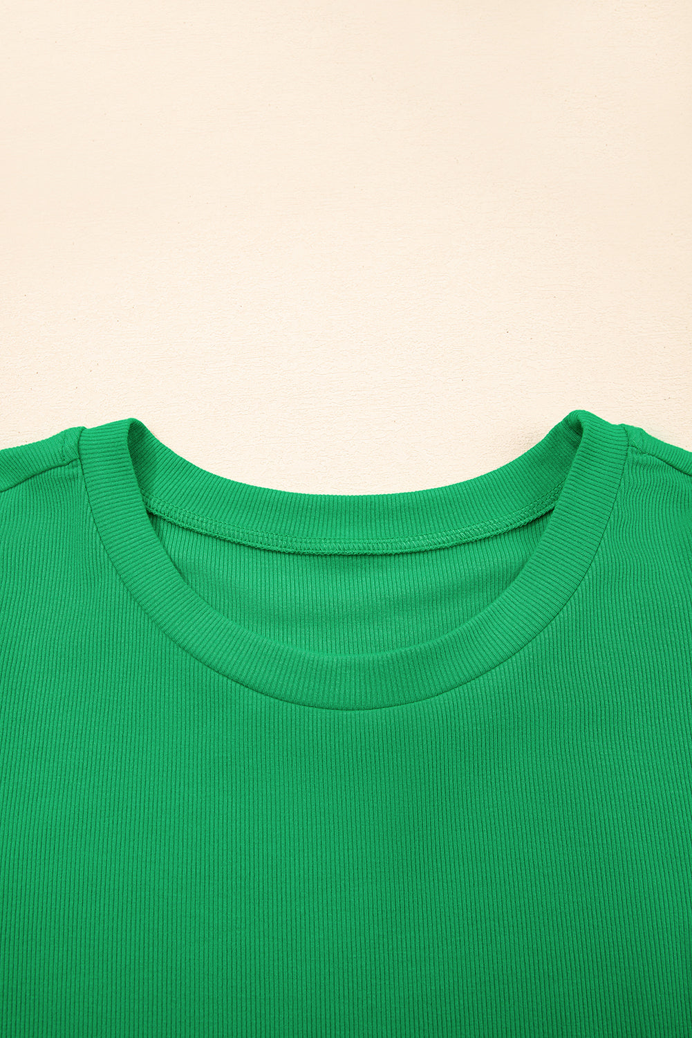 Black ribbed puff sleeve top with pearl beads from Mommas Hive, made of viscose and elastane, featuring a stylish blouse design.