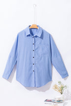 Mommas Hive black stripe long shirt with roll-tab sleeves and chest pockets, made of polyester and cotton blend, casual and stylish.