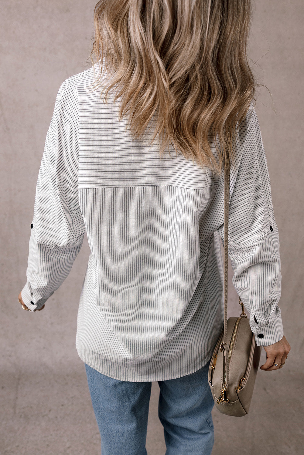 Black stripe long shirt by Mommas Hive with roll-tab sleeves and front pockets, made of polyester and cotton blend.