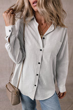 Black striped long shirt with roll-tab sleeves and front pockets, made from polyester and cotton, by Mommas Hive.