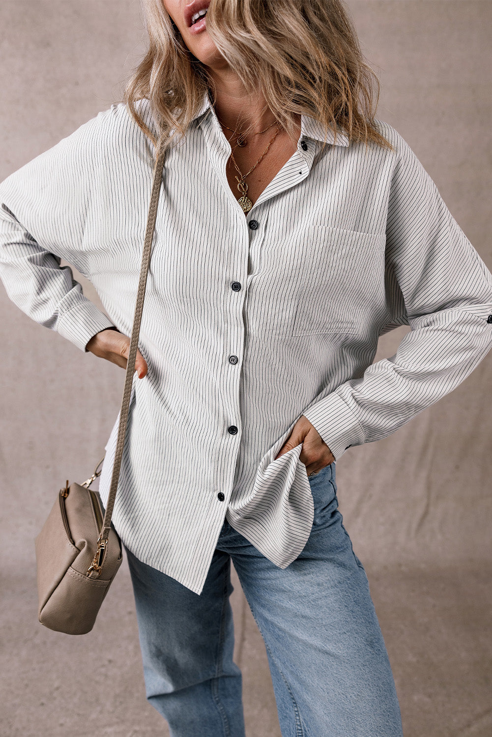 Black stripe Mommas Hive long shirt with roll-tab sleeves and front pockets, made of polyester and cotton blend.