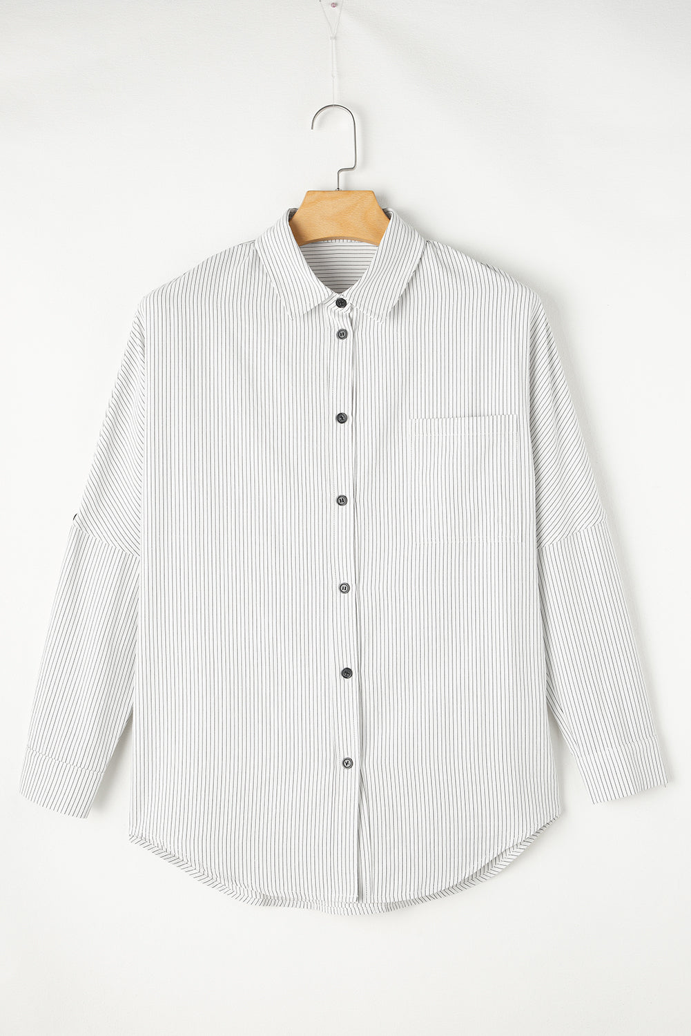 Black stripe long shirt with roll-tab sleeves and front pockets by Mommas Hive, made of polyester and cotton blend.
