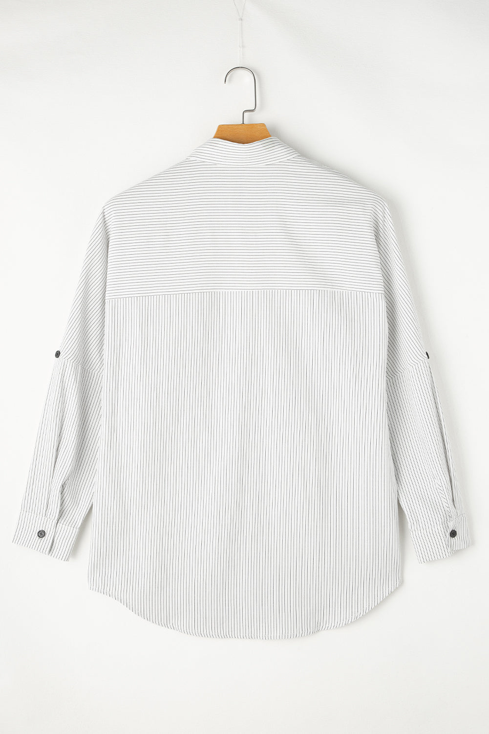 Mommas Hive black stripe long shirt with roll-tab sleeves, chest pocket, and relaxed fit, perfect as a stylish blouse or blouse.